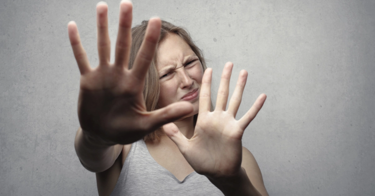 Girl with her hands up