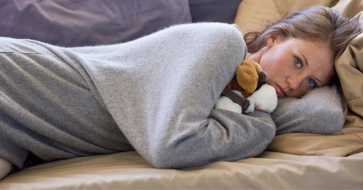 A girl laying on the couch