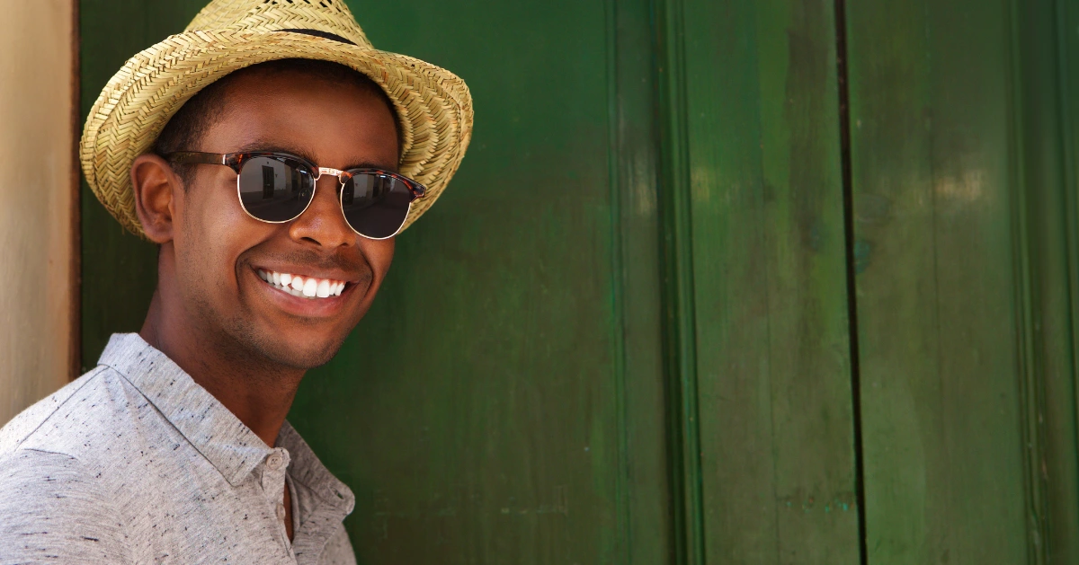 a guy smiling at the camera