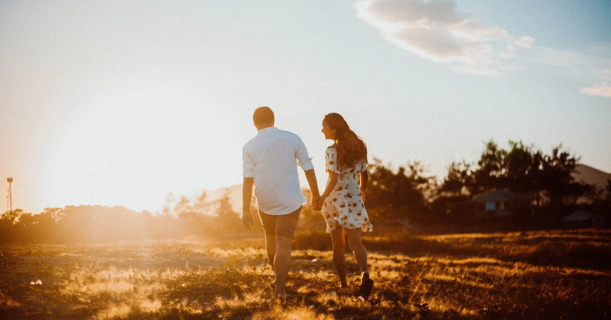 Couple holding hands