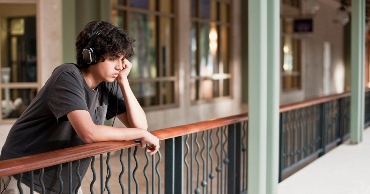A teen boy feeling sad