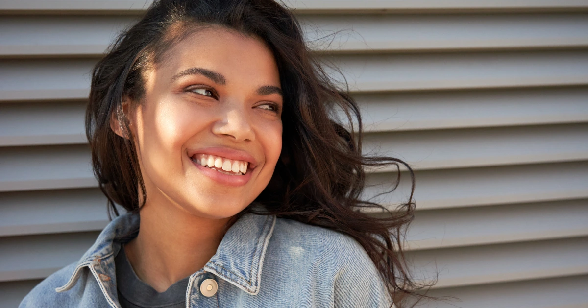 a young teen girl smiling