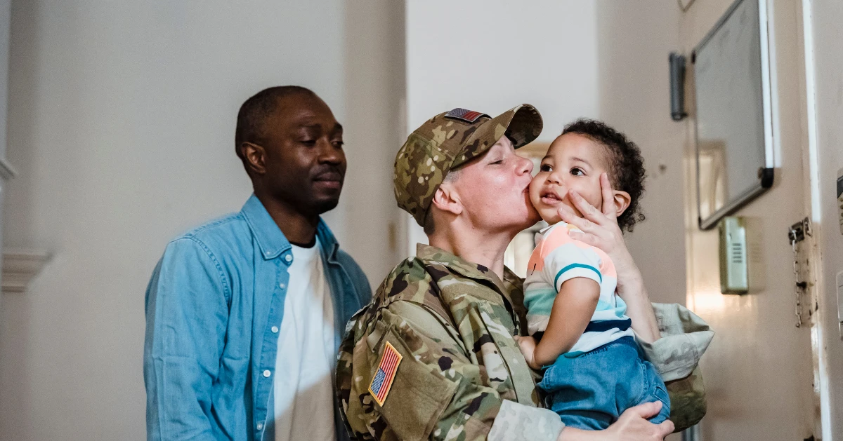 Soldier and her family