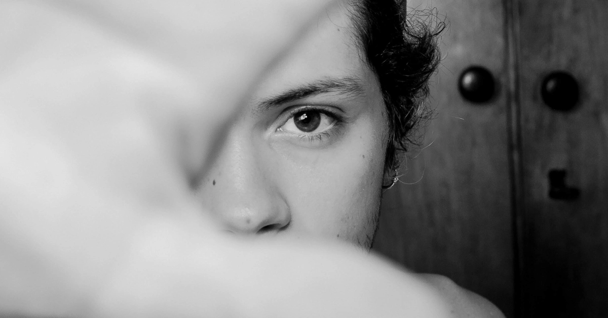 Guy covering face