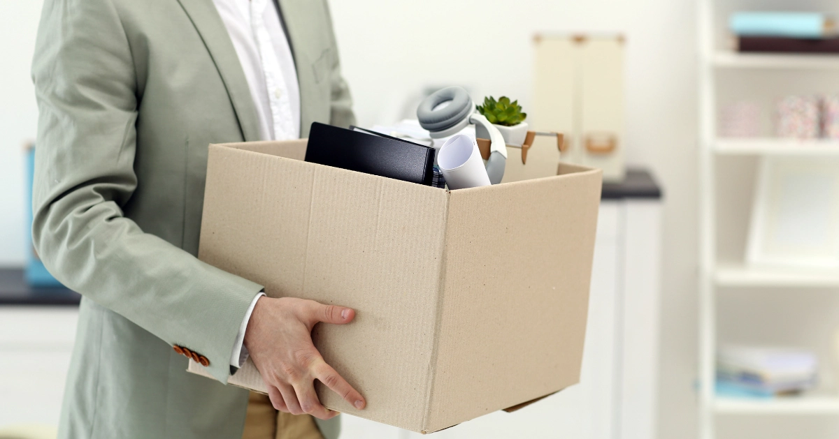 box full of office stuff after being fired