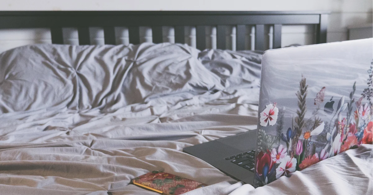 Laptop on bed
