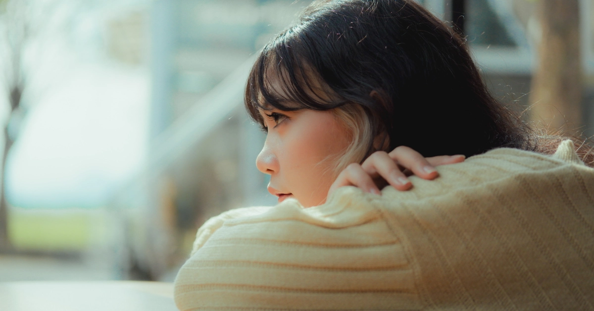 a girl looking out the window