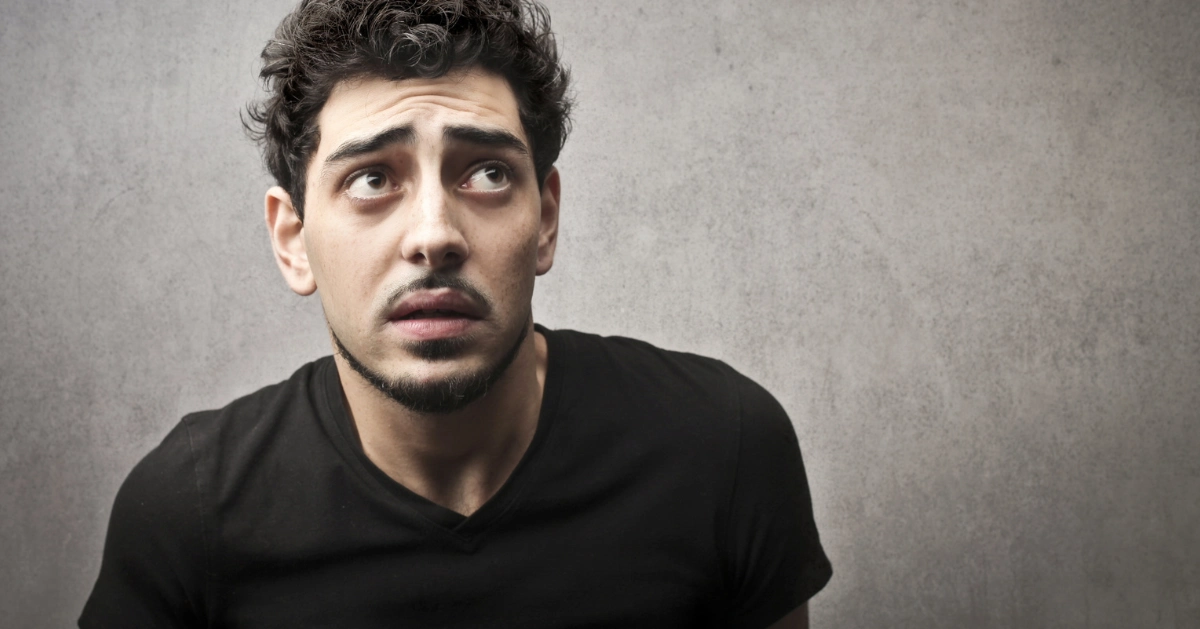 a guy with a worried look on his face