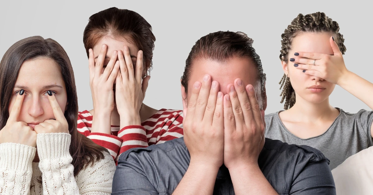 a few people covering their faces in shame