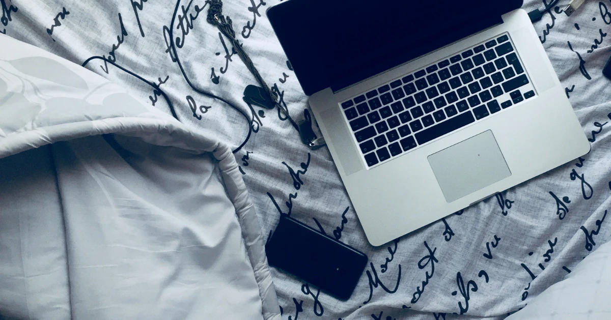 Laptop on the bed