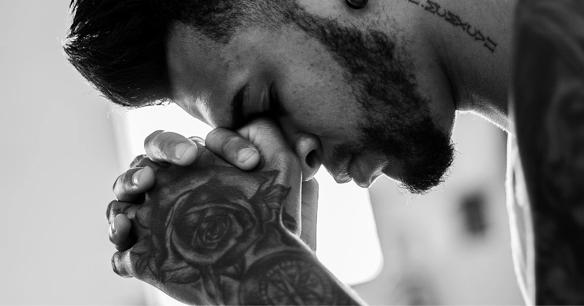 a guy praying
