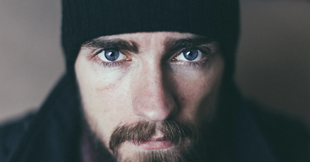a guy looking straight into the camera