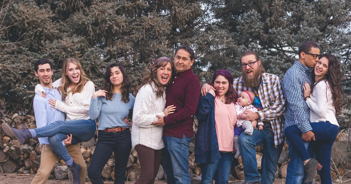 A family outside posing for a picture.