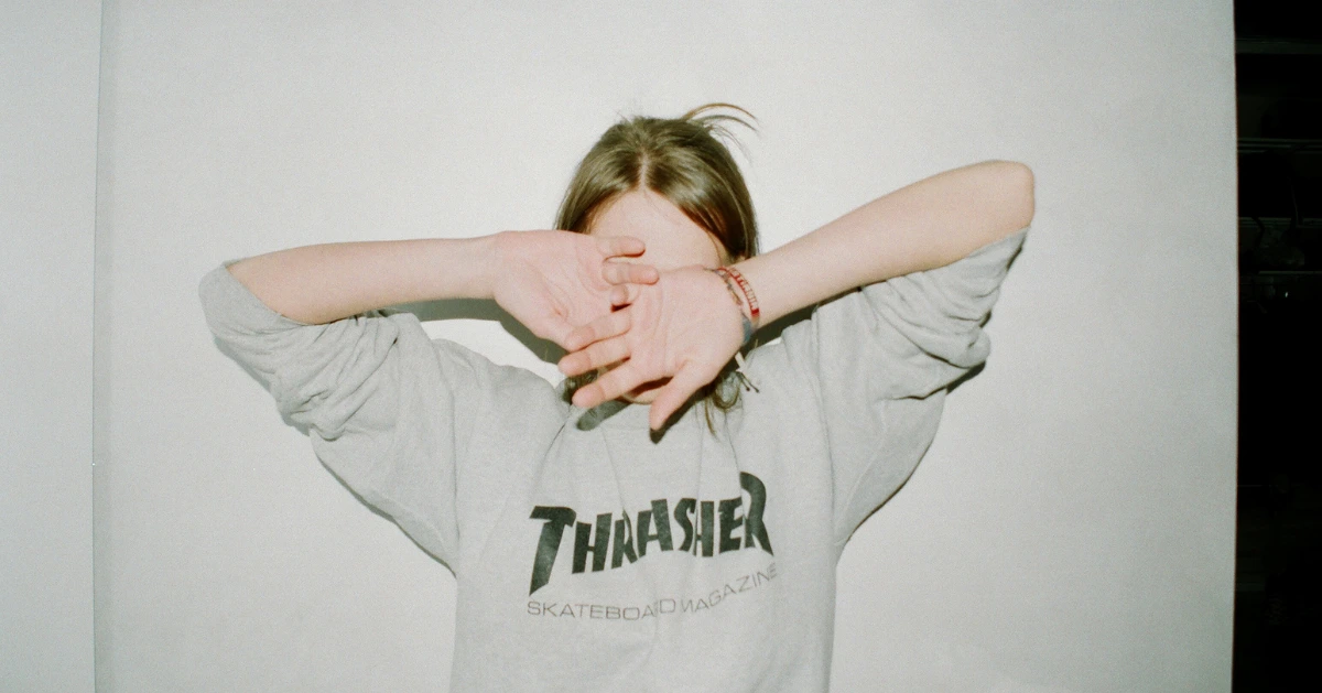 Girl hiding her face