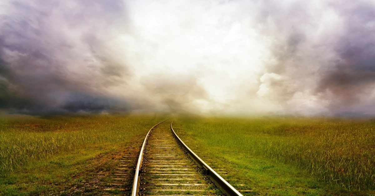 railroad tracks covered by a storm