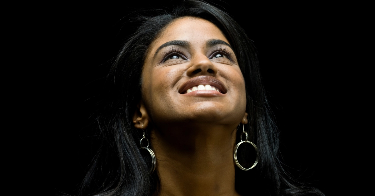 a girl looking up smiling