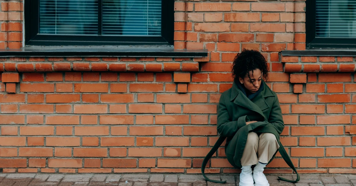 Girl sitting on floor