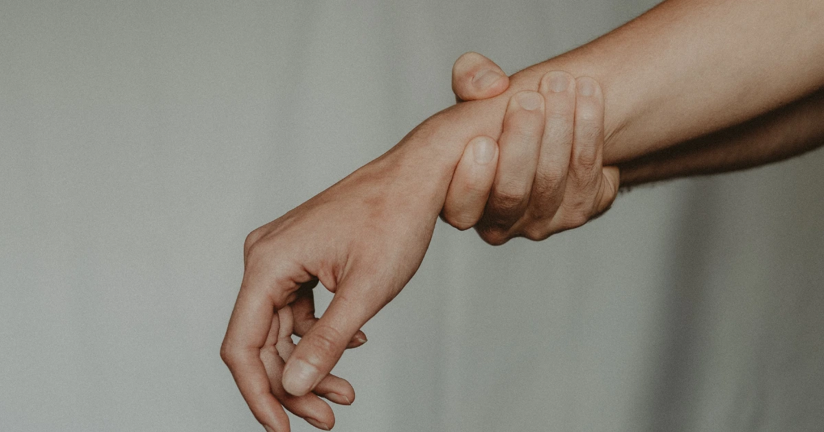 someone grabbing another person's arm
