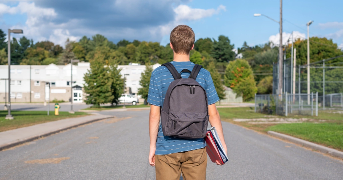 teenager walking to school