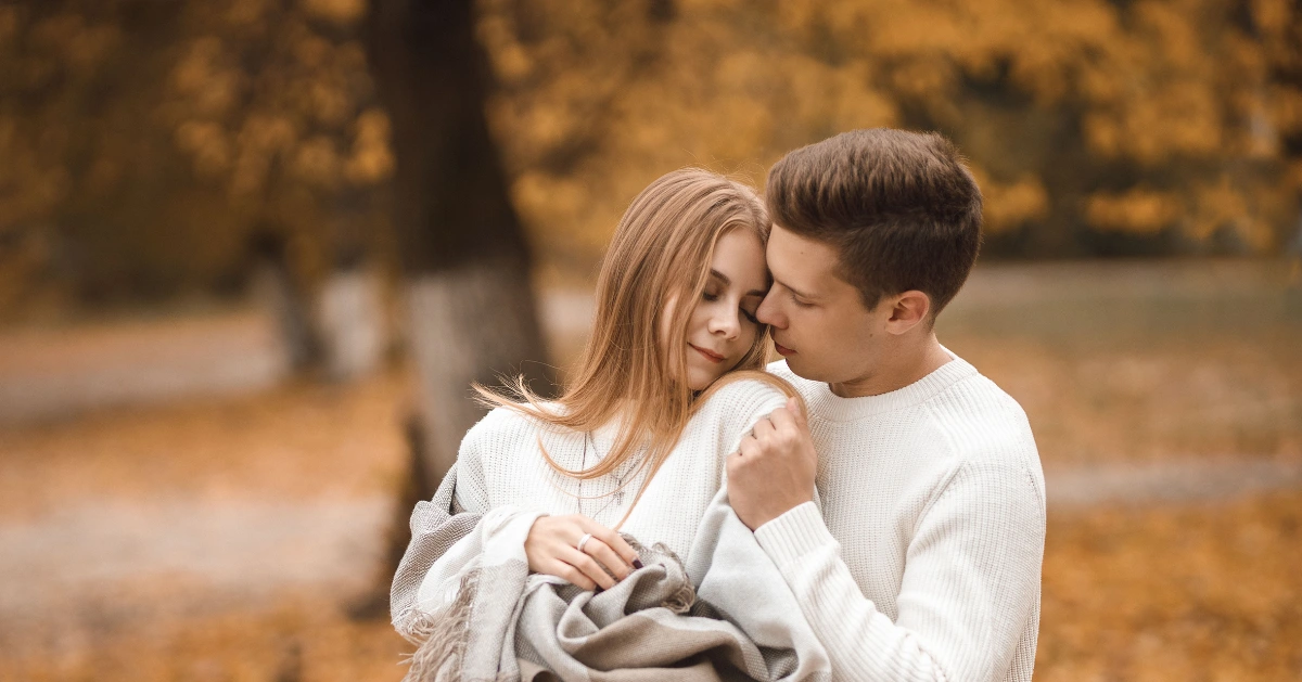 Guy hugging girl