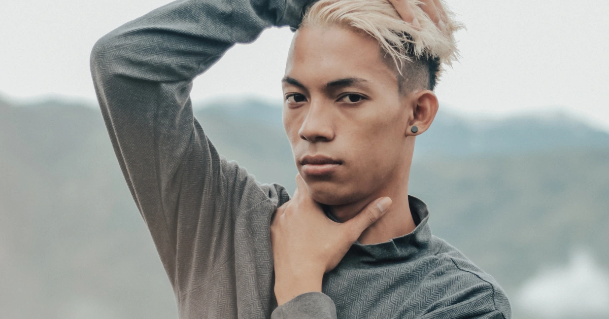 Picture of a guy holding his head