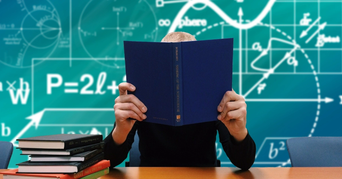 someone holding a school book