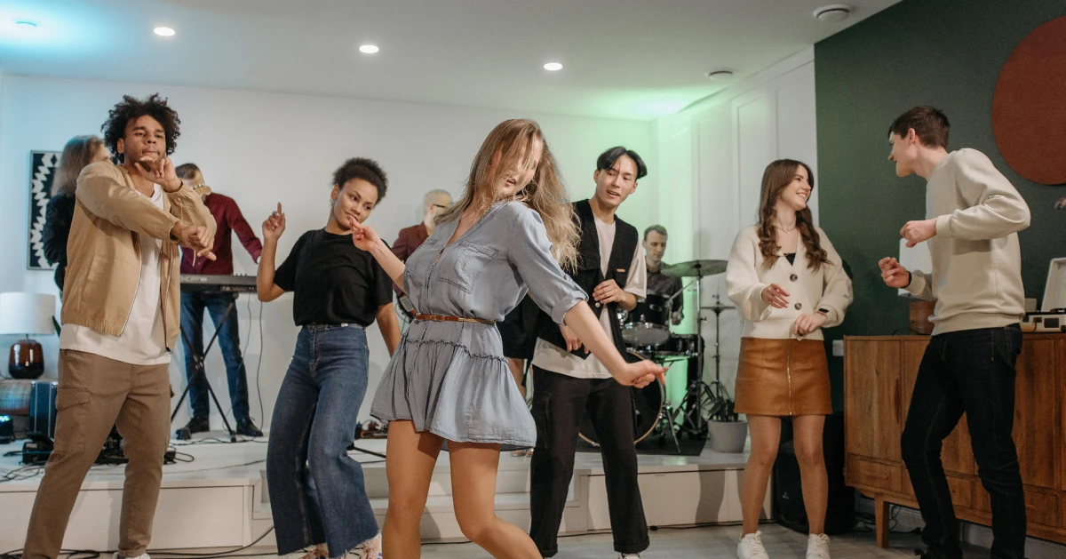 group of college kids dancing