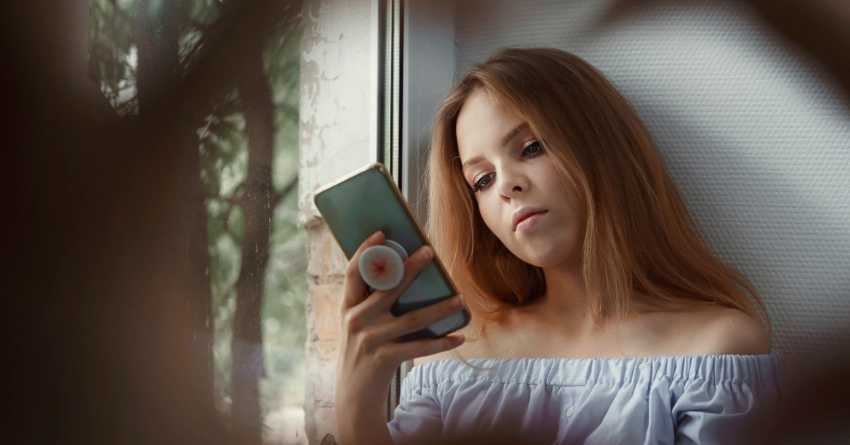 Teen girl on her phone